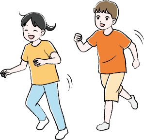 追いかけっこをしている小学生の女の子と男の子