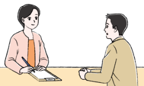 遺伝カウンセリングを受けるNF1患者さんと遺伝カウンセラー